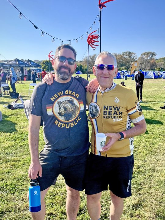Jeff Spears with his son, Neil, in their New Bear Republic jerseys.