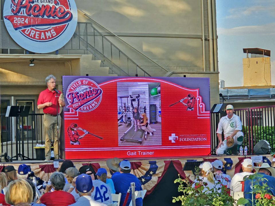 Before throwing the first pitch to Chris Dodd of the Crestline Highlanders, CEO Mark Turner talked about the need to replace equipment due to advancing technology.
