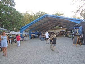 The South Shore pavilion accommodates many food and clothing vendors and has picnic tables for relaxing with friends and neighbors and dining. (Photos by Rhea-Frances Tetley)