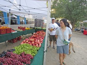 Farm-fresh fruits and vegetables are popular with Market Night attendees.