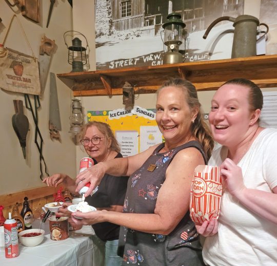 Adrianne, Lisa, Julia, Melissa and Adrianna from Glendora and Orange County enjoyed last year’s Brewfest at Tavern Bay Beach Club so much they couldn’t resist attending this year’s event. (Photos by Douglas W. Motley) Three women making ice cream sundaes together.