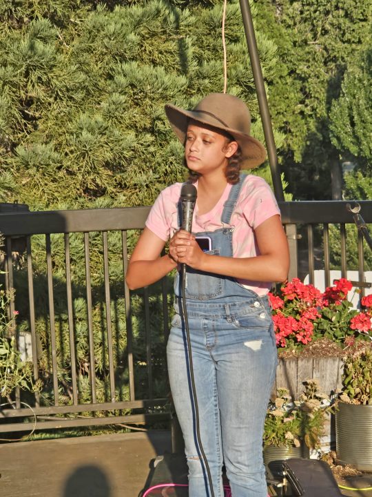 Singer Destiny finished her song “You Are Not Alone” shortly before sharing it at the open mic night.