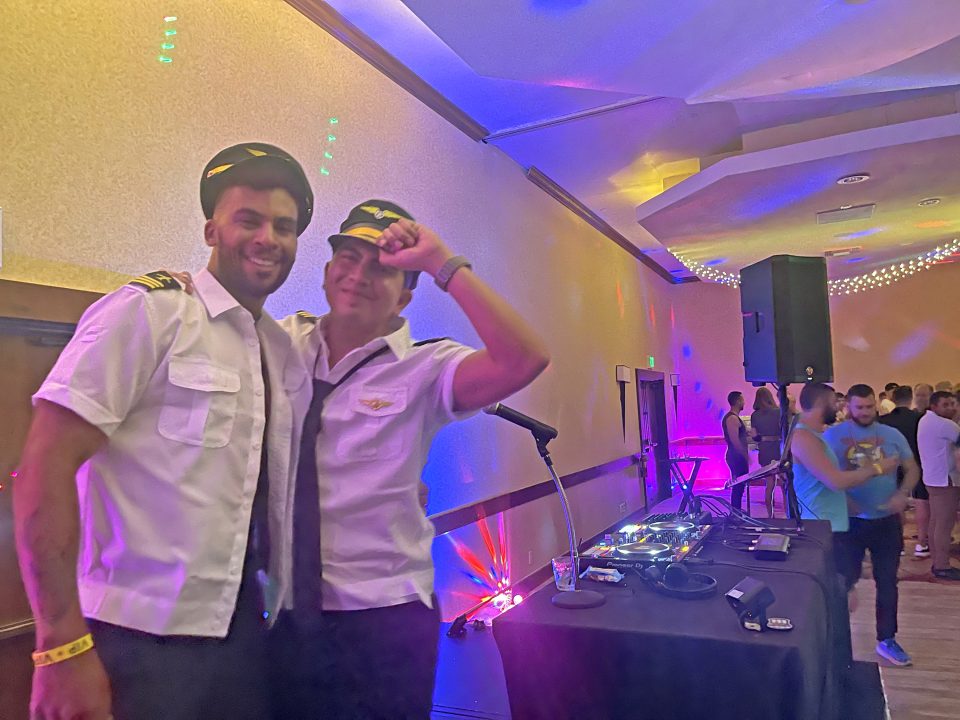 The DJ and a dancer at the Mile Hill Club closing event.