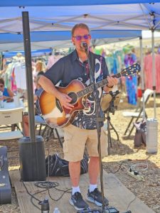 Mark Segal was the musician entertaining the visitors to the market on July 20.