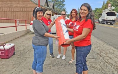 Volunteer steps up to hang Hometown Heroes banners