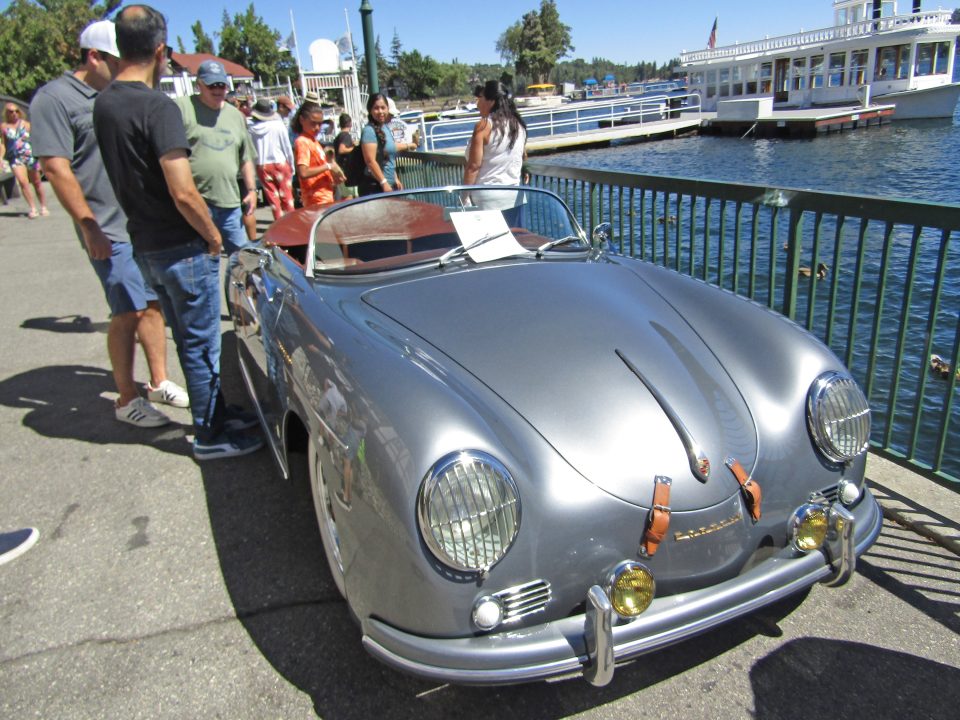 Adrianne, Lisa, Julia, Melissa and Adrianna from Glendora and Orange County enjoyed last year’s Brewfest at Tavern Bay Beach Club so much they couldn’t resist attending this year’s event. (Photos by Douglas W. Motley) Classic silver car at waterfront with people around.