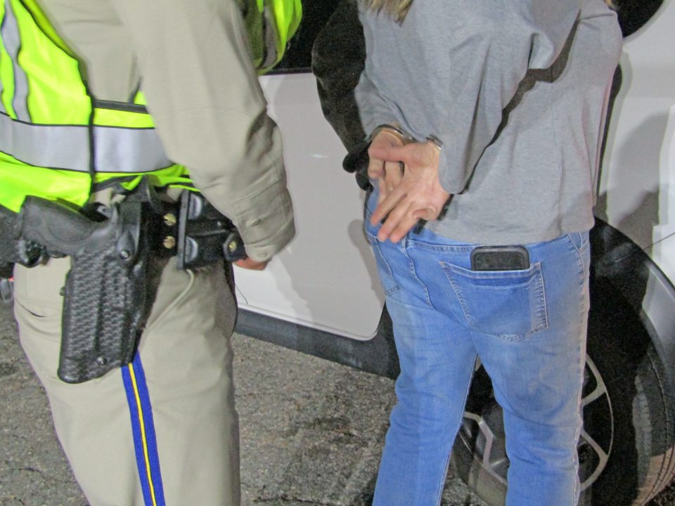 Adrianne, Lisa, Julia, Melissa and Adrianna from Glendora and Orange County enjoyed last year’s Brewfest at Tavern Bay Beach Club so much they couldn’t resist attending this year’s event. (Photos by Douglas W. Motley) Police officer arresting suspect near vehicle.