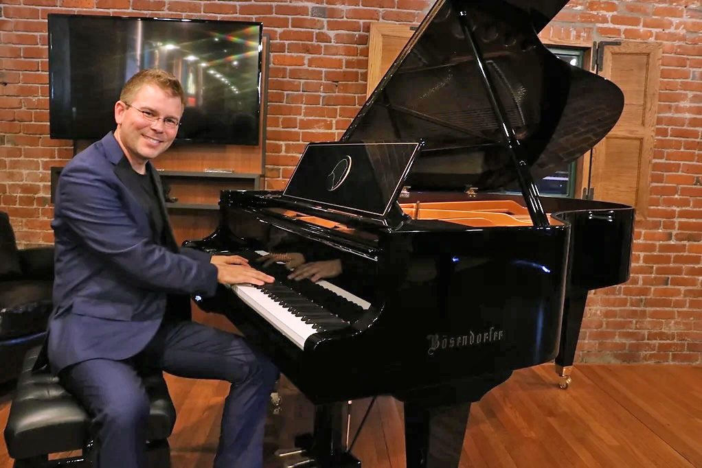 Adrianne, Lisa, Julia, Melissa and Adrianna from Glendora and Orange County enjoyed last year’s Brewfest at Tavern Bay Beach Club so much they couldn’t resist attending this year’s event. (Photos by Douglas W. Motley) Person playing grand piano in brick room.
