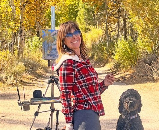 Adrianne, Lisa, Julia, Melissa and Adrianna from Glendora and Orange County enjoyed last year’s Brewfest at Tavern Bay Beach Club so much they couldn’t resist attending this year’s event. (Photos by Douglas W. Motley) Woman painting outdoors with dog, autumn scenery.
