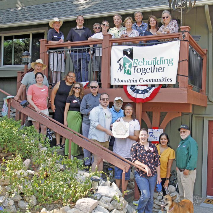 Adrianne, Lisa, Julia, Melissa and Adrianna from Glendora and Orange County enjoyed last year’s Brewfest at Tavern Bay Beach Club so much they couldn’t resist attending this year’s event. (Photos by Douglas W. Motley) Group posing at Rebuilding Together event on a porch.