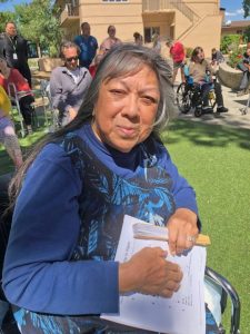 Zee Salva, 10-year resident of the Skilled Nursing Facility, sang a beautiful solo, “Precious Lord Take My Hand.”