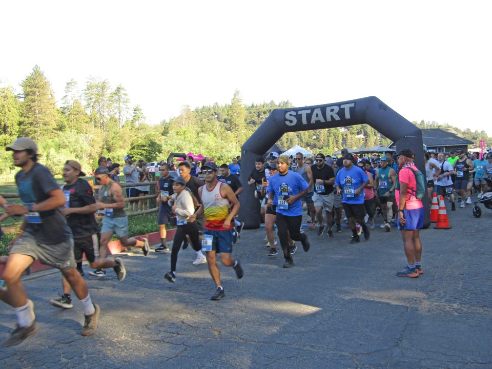 Adrianne, Lisa, Julia, Melissa and Adrianna from Glendora and Orange County enjoyed last year’s Brewfest at Tavern Bay Beach Club so much they couldn’t resist attending this year’s event. (Photos by Douglas W. Motley) People running marathon under inflatable start arch.