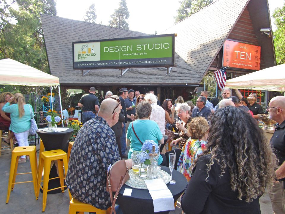Guests at the TEN Marketplace ribbon cutting enjoyed tacos, champagne and the music of the Little Bear Valley Blues band. (Photos by Rhea-Frances Tetley)