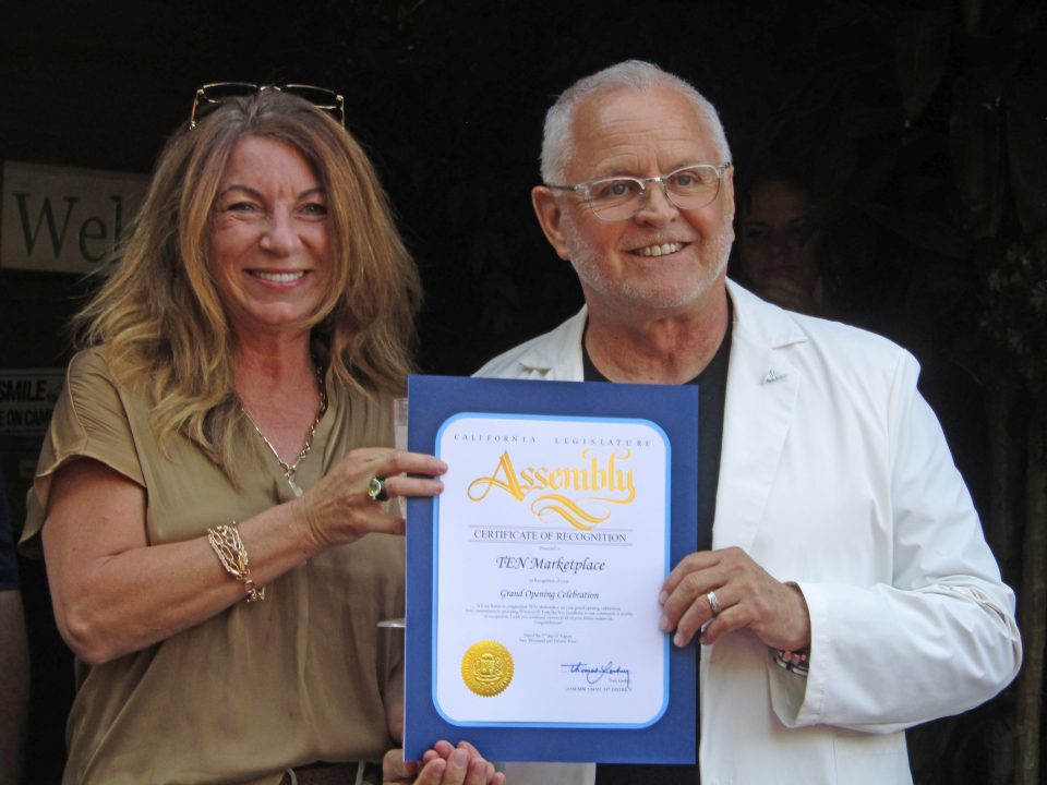 Adrianne, Lisa, Julia, Melissa and Adrianna from Glendora and Orange County enjoyed last year’s Brewfest at Tavern Bay Beach Club so much they couldn’t resist attending this year’s event. (Photos by Douglas W. Motley) Two people holding a certificate of recognition.