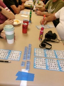 The bingo cards and dobbers.