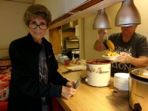 Penny Shubnell, Crest Forest Senior Citizen Club president, trying out the snacks during bingo night at Leisure Shores.