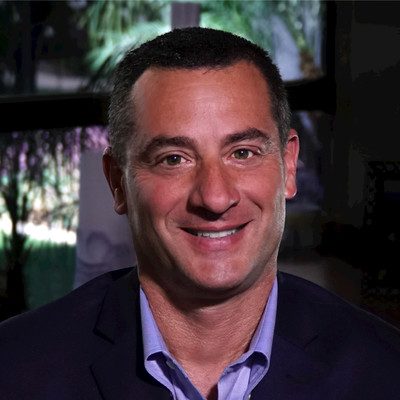 Smiling person in a business setting.