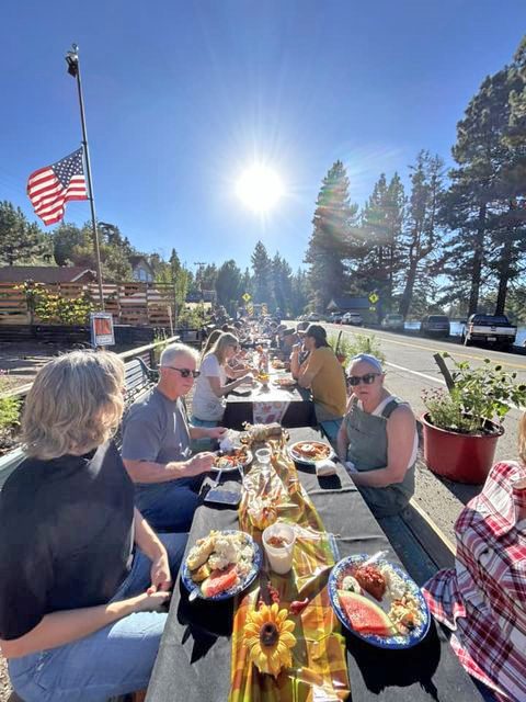 Adrianne, Lisa, Julia, Melissa and Adrianna from Glendora and Orange County enjoyed last year’s Brewfest at Tavern Bay Beach Club so much they couldn’t resist attending this year’s event. (Photos by Douglas W. Motley) Outdoor community feast on a sunny day