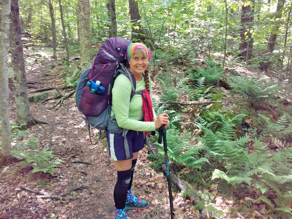 Adrianne, Lisa, Julia, Melissa and Adrianna from Glendora and Orange County enjoyed last year’s Brewfest at Tavern Bay Beach Club so much they couldn’t resist attending this year’s event. (Photos by Douglas W. Motley) Woman hiking in forest with large backpack.