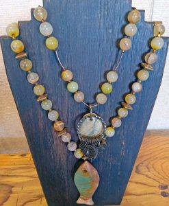 These two pieces are made from Jasper, opal agates and brass. Each can be worn individually or together as an expressive art statement