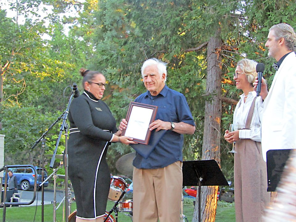 Jack Cooperman is presented a certificate of appreciation from Assemblyman Tom Lackey’s representative, with event host Brian Cohen on the right with Andrea, the gala’s organizer.