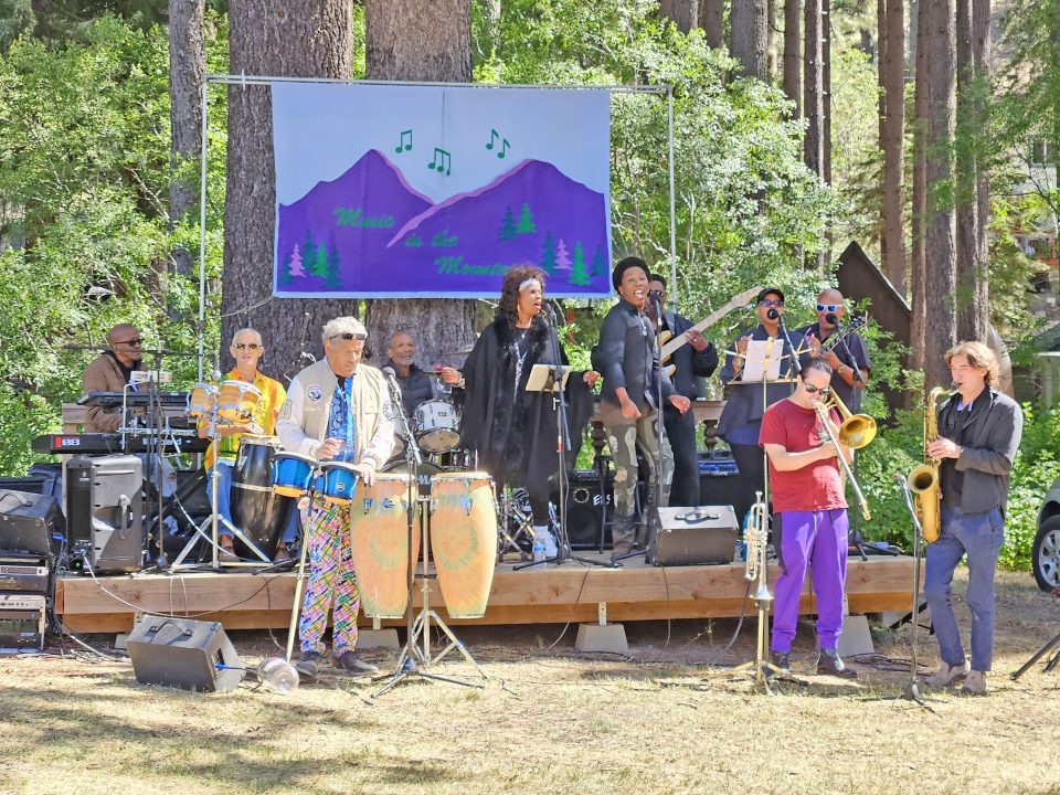 Band performing at outdoor music festival