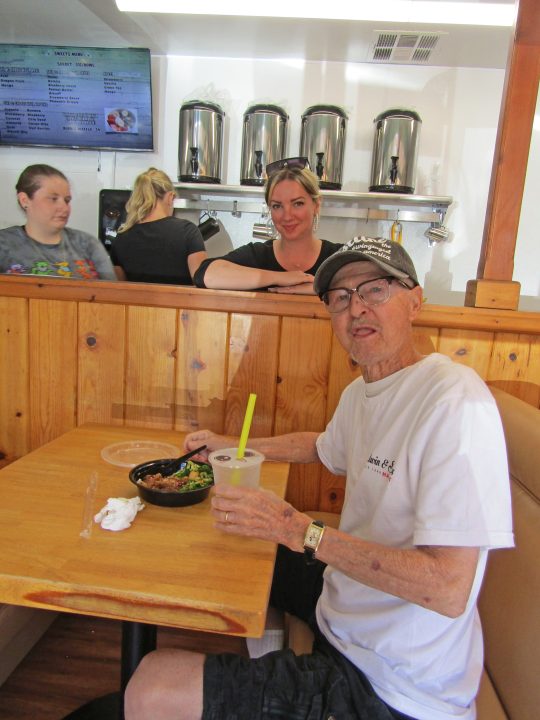 Sweet Pea’s owner Amber Crubaugh smiles as Crestline historian and author Russ Keller enjoys a refreshing beverage.