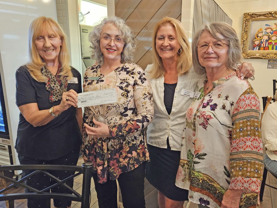 President Jeri Simpson (second from left) presented a check for $500 to Karen Rowell, Kathy Lewis and Marilyn Mays, representing the Lake Arrowhead New Friends of the Library.