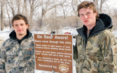 Two collegiate wrestlers employ their skills to fend off a grizzly bear