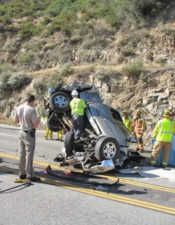 Adrianne, Lisa, Julia, Melissa and Adrianna from Glendora and Orange County enjoyed last year’s Brewfest at Tavern Bay Beach Club so much they couldn’t resist attending this year’s event. (Photos by Douglas W. Motley) Overturned car on mountain road, emergency responders present.
