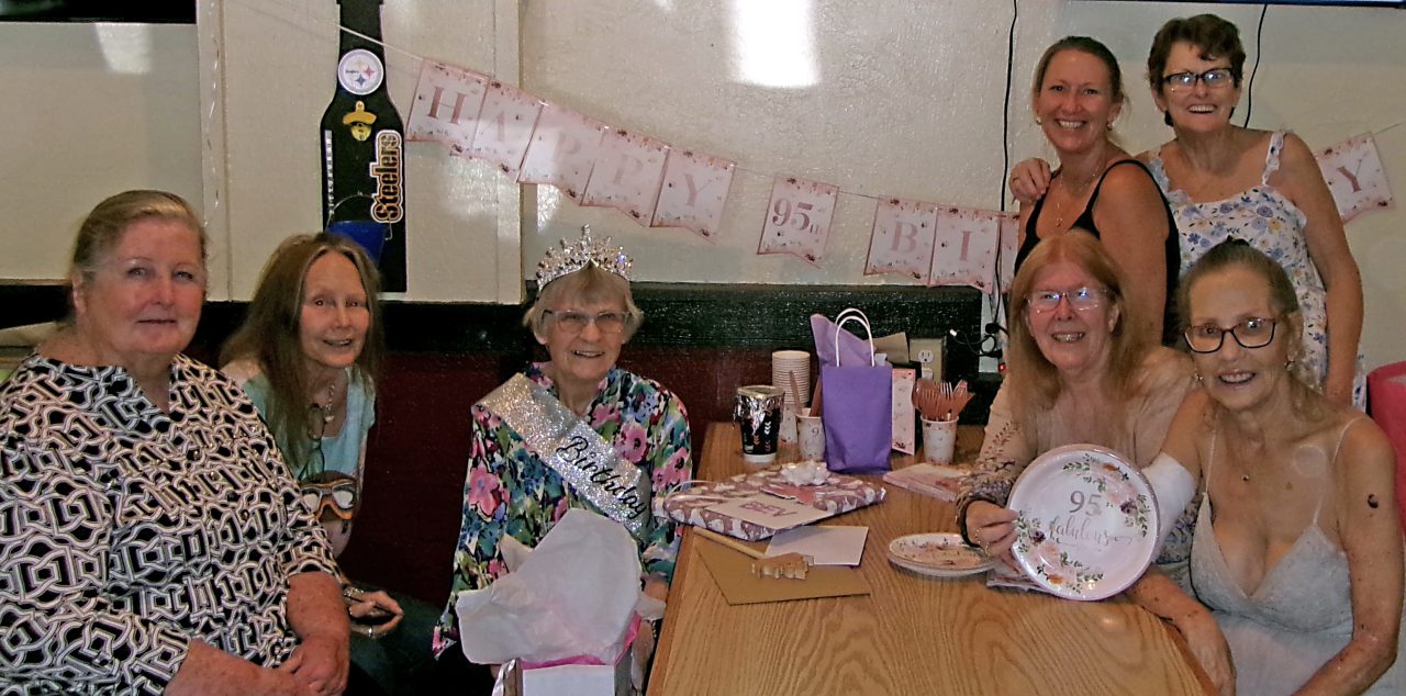 Some of the Crestline Breakfast Club members with Beverly celebrating her 95th birthday.
