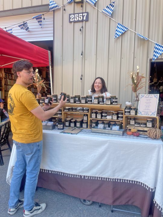 Emily Nohr, owner of Juniper Candle Co., was there to support Brown Bag Books and sell her soy candles.
