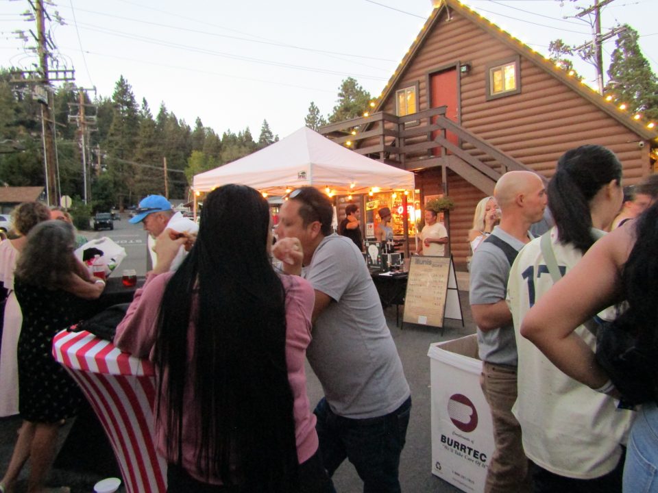 Participants mingle at Encompass Antiques.