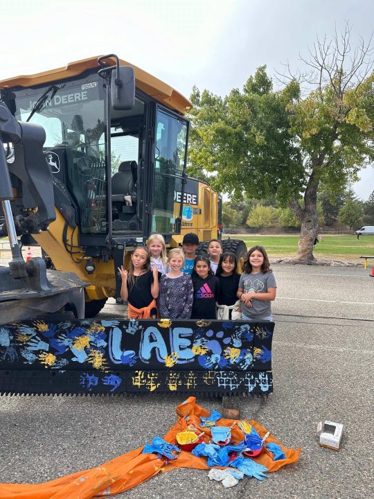 Adrianne, Lisa, Julia, Melissa and Adrianna from Glendora and Orange County enjoyed last year’s Brewfest at Tavern Bay Beach Club so much they couldn’t resist attending this year’s event. (Photos by Douglas W. Motley) Kids posing with painted construction vehicle.