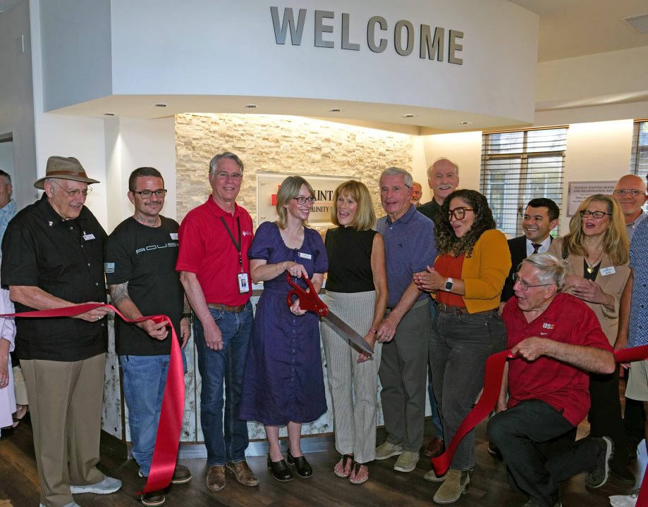 Adrianne, Lisa, Julia, Melissa and Adrianna from Glendora and Orange County enjoyed last year’s Brewfest at Tavern Bay Beach Club so much they couldn’t resist attending this year’s event. (Photos by Douglas W. Motley) Group cutting ribbon at an event under welcome sign.