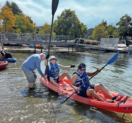 RSA President Jack Cooperman helping the Lighthouse participants with their kayaks.