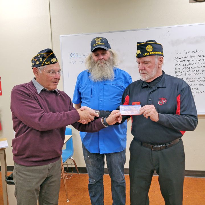 Adrianne, Lisa, Julia, Melissa and Adrianna from Glendora and Orange County enjoyed last year’s Brewfest at Tavern Bay Beach Club so much they couldn’t resist attending this year’s event. (Photos by Douglas W. Motley) Veterans presenting a donation check in classroom.