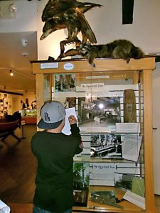 A student filling out his scavenger hunt paper. (Photo by Rhea-Frances Tetley)