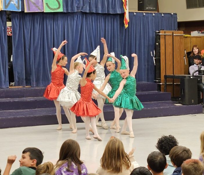 Adrianne, Lisa, Julia, Melissa and Adrianna from Glendora and Orange County enjoyed last year’s Brewfest at Tavern Bay Beach Club so much they couldn’t resist attending this year’s event. (Photos by Douglas W. Motley) Children in colorful costumes performing a dance.