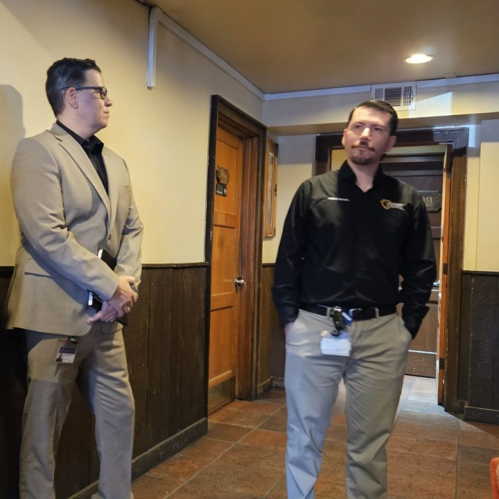 Kristian Alfelor (left), the division chief of the county’s Environmental Health Services, listens as Jonathan Lara explains how the food trucks are permitted by the county.