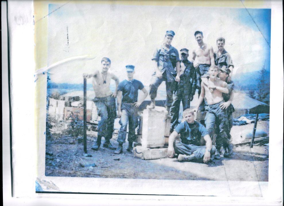 Group of soldiers posing outdoors