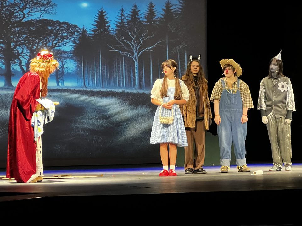 Adrianne, Lisa, Julia, Melissa and Adrianna from Glendora and Orange County enjoyed last year’s Brewfest at Tavern Bay Beach Club so much they couldn’t resist attending this year’s event. (Photos by Douglas W. Motley) Stage play with Wizard of Oz characters performing.