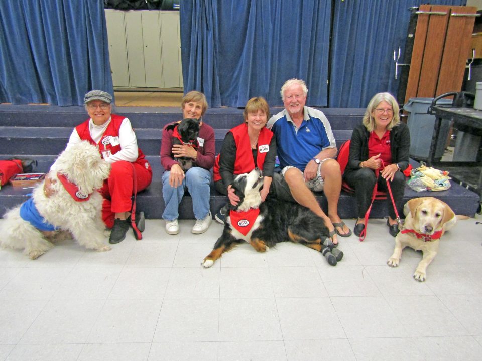 Adrianne, Lisa, Julia, Melissa and Adrianna from Glendora and Orange County enjoyed last year’s Brewfest at Tavern Bay Beach Club so much they couldn’t resist attending this year’s event. (Photos by Douglas W. Motley) Group of people and therapy dogs smiling together.