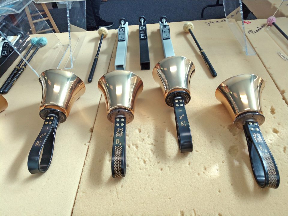 Adrianne, Lisa, Julia, Melissa and Adrianna from Glendora and Orange County enjoyed last year’s Brewfest at Tavern Bay Beach Club so much they couldn’t resist attending this year’s event. (Photos by Douglas W. Motley) Four handbells on table with mallets.