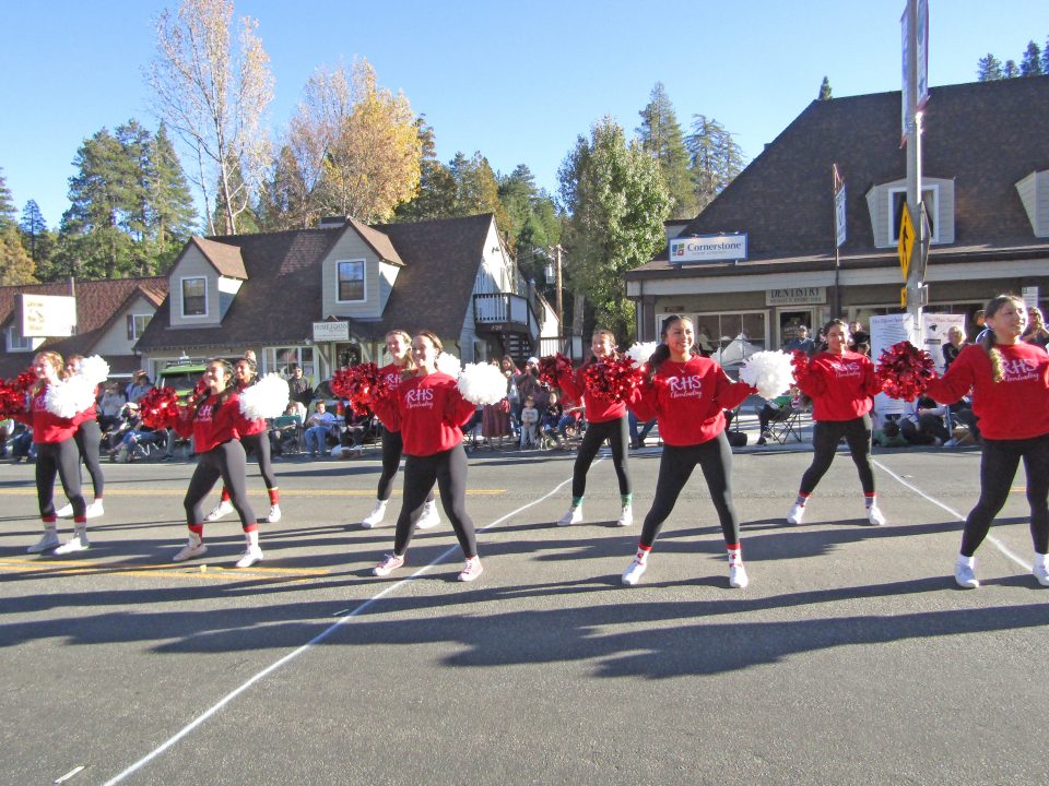 Rim High School cheerleaders entertained spectators along the parade route.