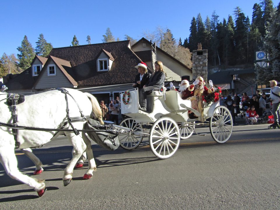 Heralding the Christmas season was Santa himself, accompanied by Mrs. Claus, in SkyPark at Santa’s Village horse-drawn carriage.