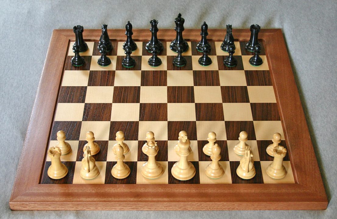 Chessboard with pieces set for play