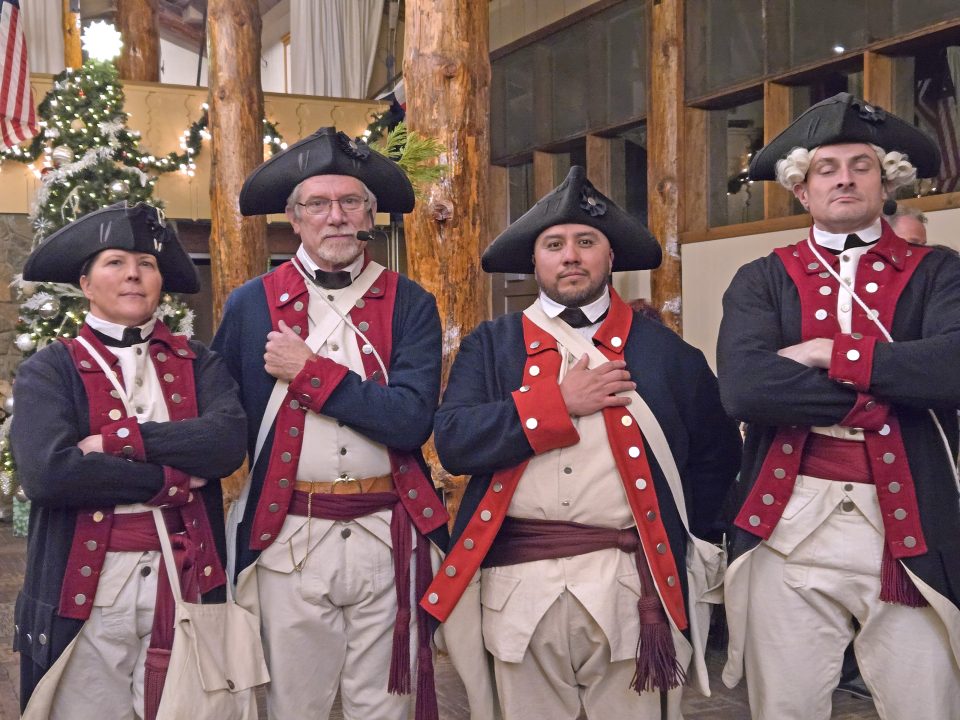 The adult speakers at the Colonial Christmas concert.