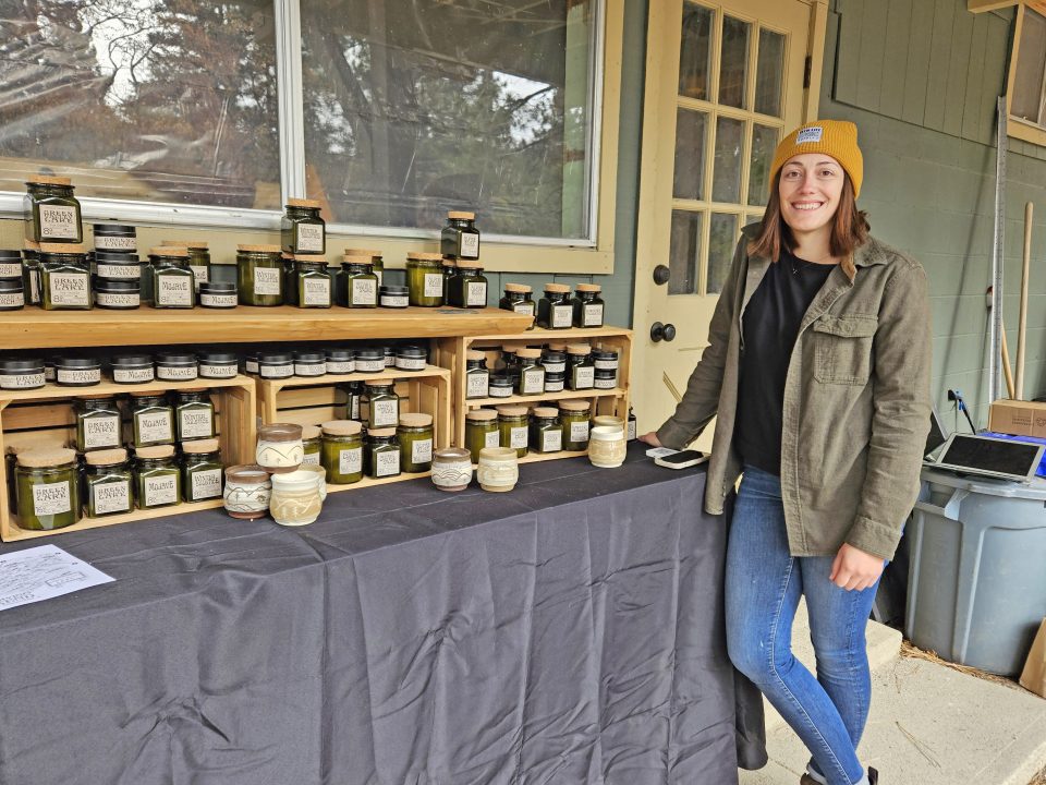 Adrianne, Lisa, Julia, Melissa and Adrianna from Glendora and Orange County enjoyed last year’s Brewfest at Tavern Bay Beach Club so much they couldn’t resist attending this year’s event. (Photos by Douglas W. Motley) Person selling homemade candles and jars outside.