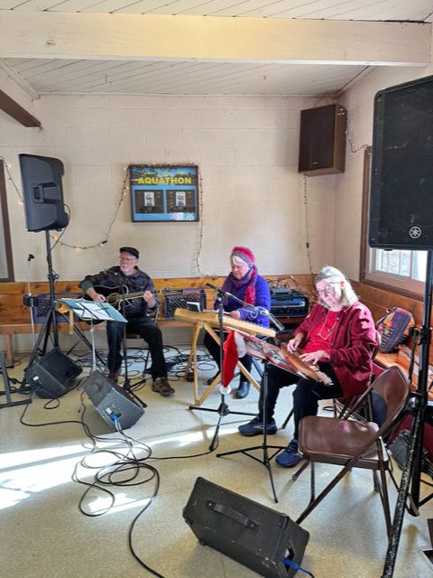 Patrick Huckaby, Sandi Huckaby and Grace Monsma provided Christmas music throughout the day and evening,